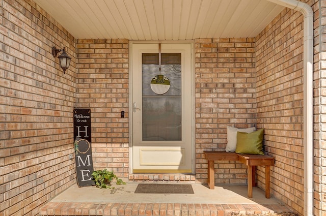 doorway to property featuring a porch