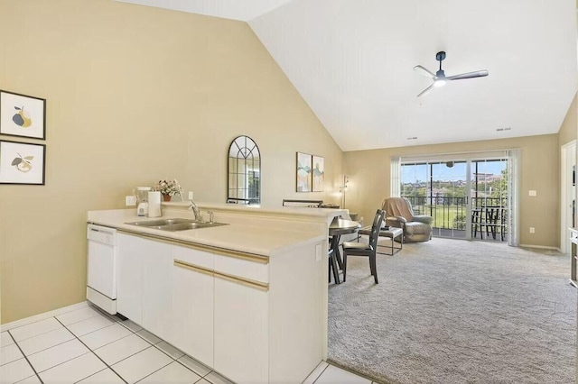 kitchen with light colored carpet, open floor plan, a sink, dishwasher, and a peninsula