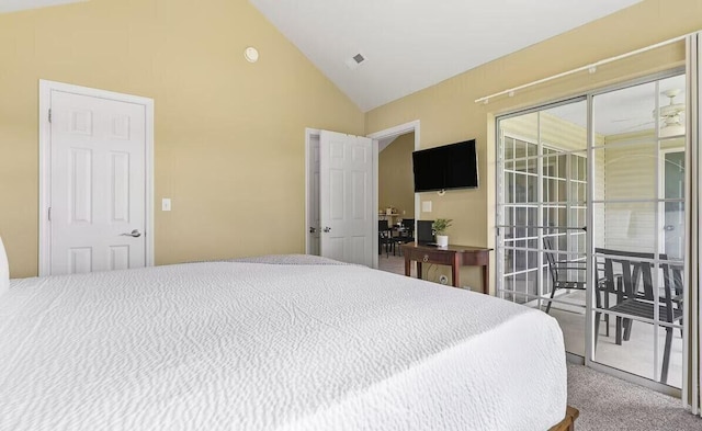 carpeted bedroom with lofted ceiling and access to outside