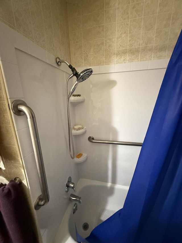 full bathroom with shower / bath combo