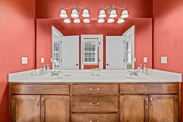 bathroom with double vanity and a sink