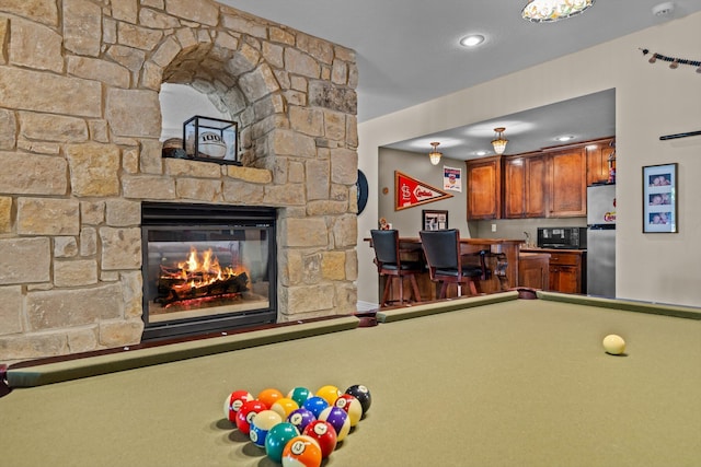 playroom with a fireplace, recessed lighting, pool table, carpet flooring, and wet bar