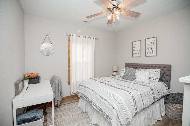 bedroom with a ceiling fan and visible vents