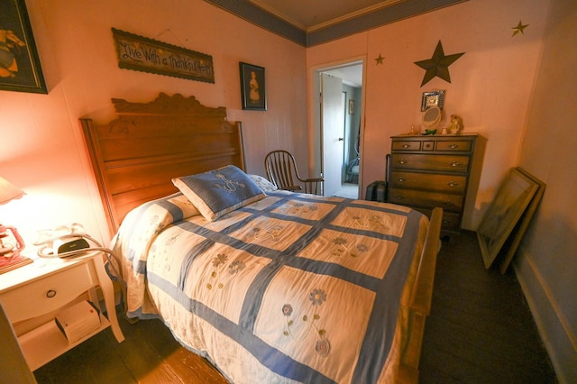 bedroom with crown molding