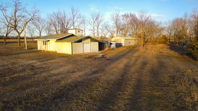 view of side of home featuring driveway