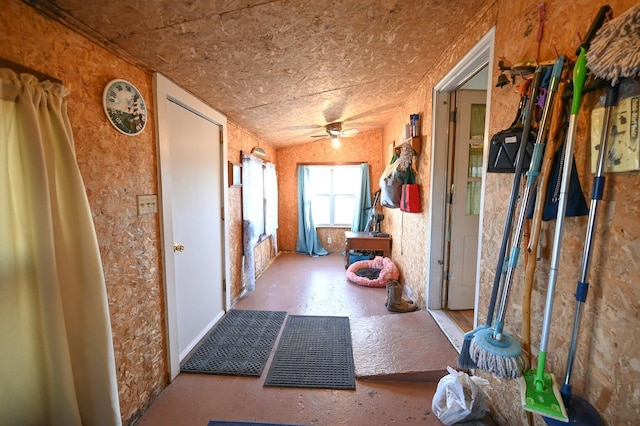 entryway with a ceiling fan