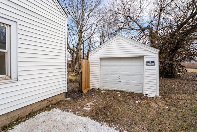 detached garage with fence