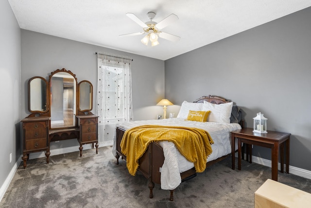 bedroom with carpet floors, a ceiling fan, and baseboards