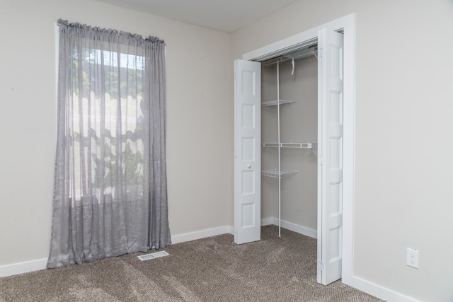 closet featuring visible vents