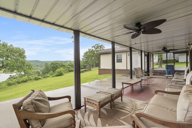 view of patio featuring ceiling fan and outdoor lounge area