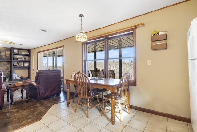 dining room featuring visible vents and baseboards