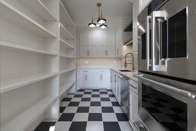 pantry with a sink