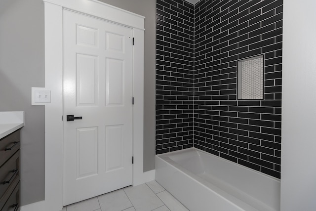 bathroom with tile patterned flooring and vanity