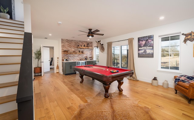 rec room featuring light wood-style floors, recessed lighting, billiards, and wet bar