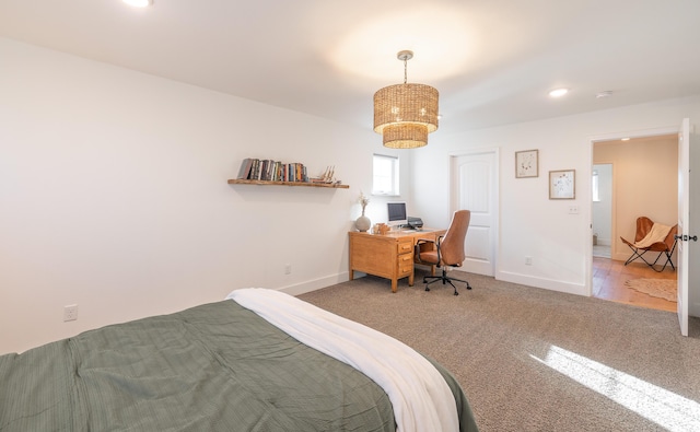 carpeted bedroom featuring recessed lighting and baseboards