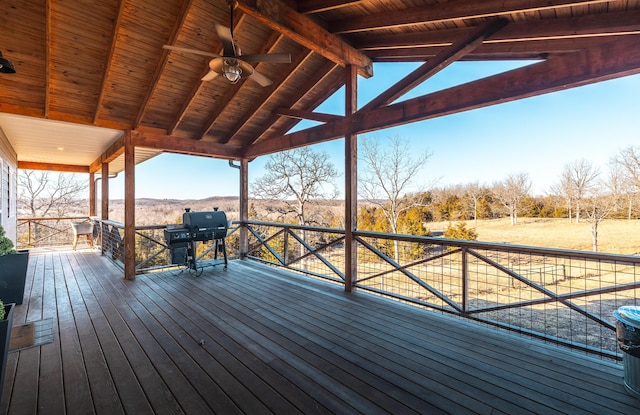 wooden terrace with area for grilling