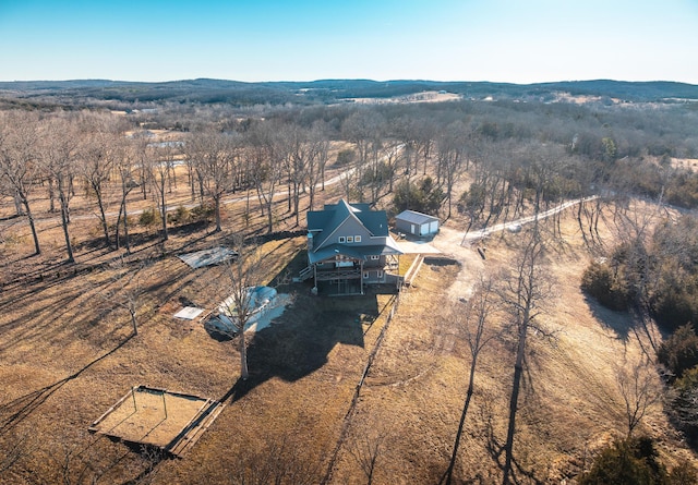 bird's eye view featuring a view of trees