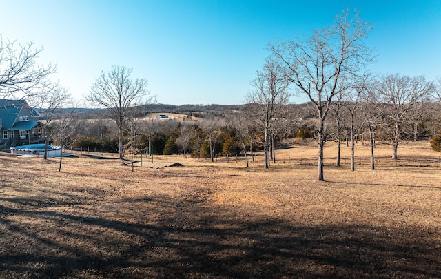 exterior space with a rural view