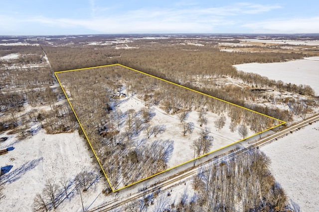 birds eye view of property featuring a rural view