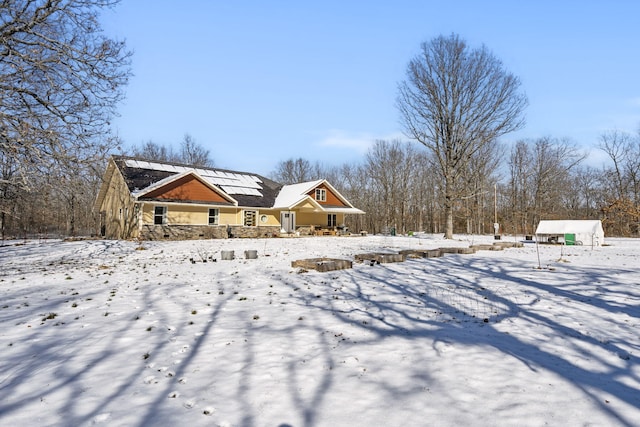 view of yard layered in snow