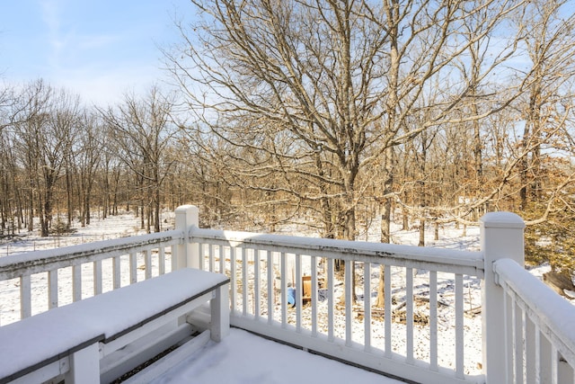 view of snow covered deck