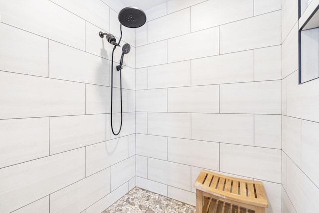 details with a tile shower