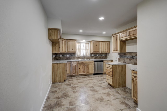 kitchen with tasteful backsplash, recessed lighting, stainless steel dishwasher, a sink, and baseboards