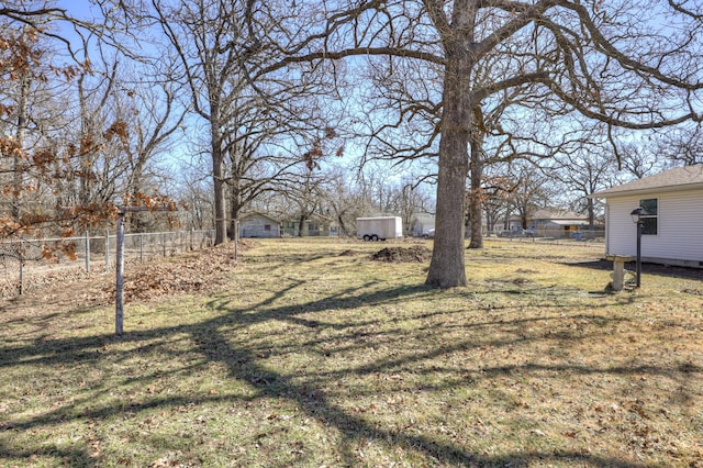 view of yard with fence