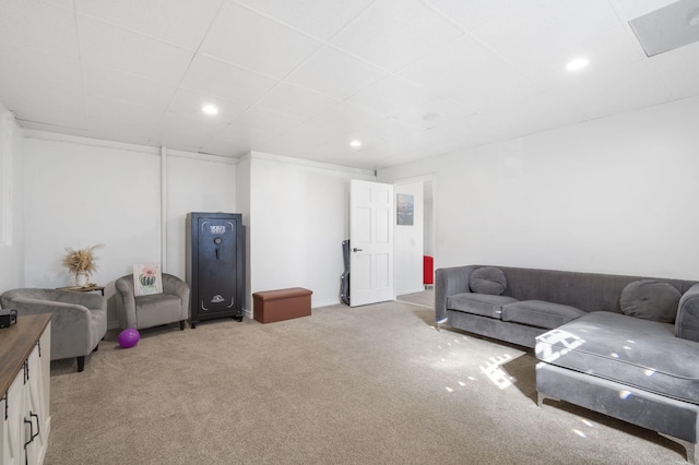 living room featuring recessed lighting and light colored carpet