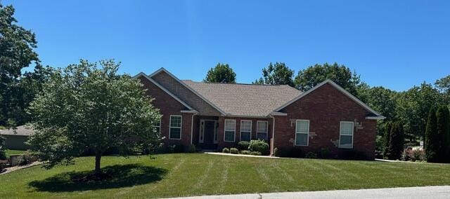 view of front of house with a front lawn