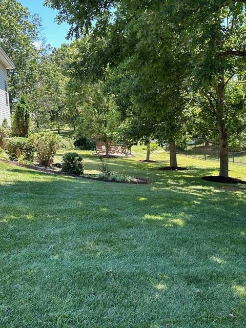 view of yard featuring fence