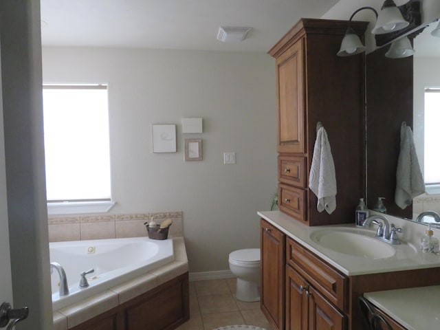 full bath featuring toilet, visible vents, vanity, a jetted tub, and tile patterned floors