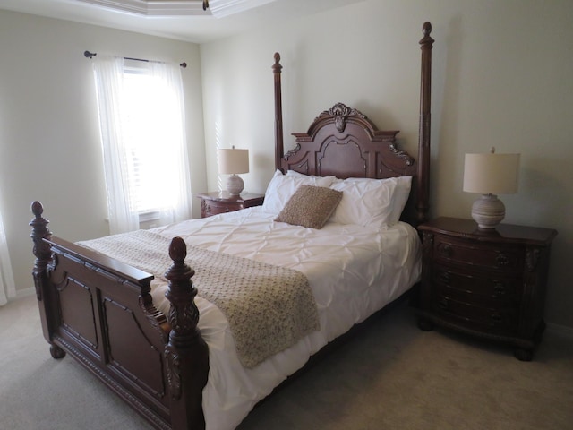 bedroom featuring light carpet