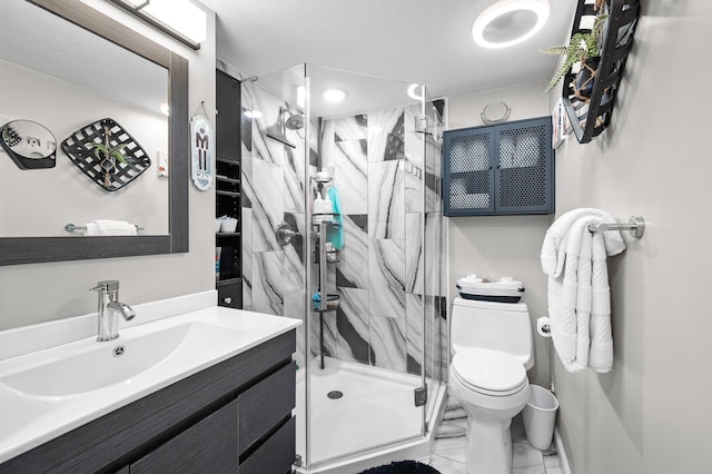 bathroom with a stall shower, marble finish floor, vanity, and toilet