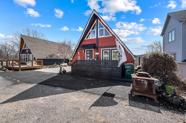 view of front of home featuring a wooden deck