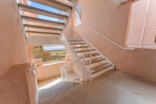 stairs with a high ceiling