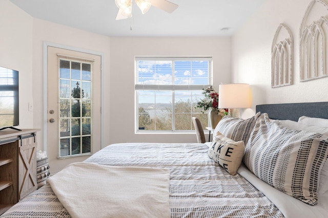 bedroom featuring access to exterior and ceiling fan