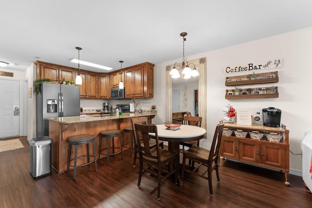 dining room featuring dark wood finished floors