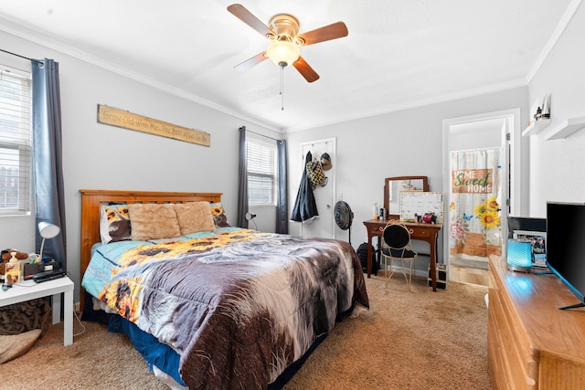 bedroom with ornamental molding, carpet flooring, and a ceiling fan