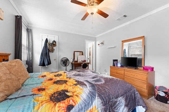 bedroom featuring carpet floors, multiple windows, visible vents, and crown molding