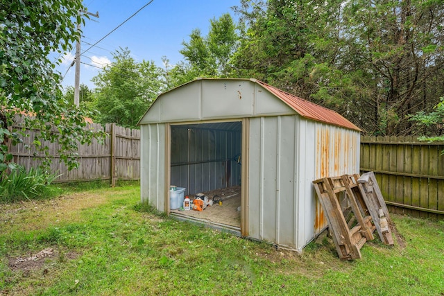 view of shed featuring a fenced backyard