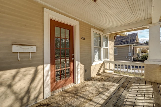 deck with covered porch