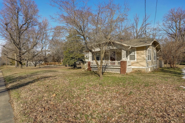 view of home's exterior with a lawn