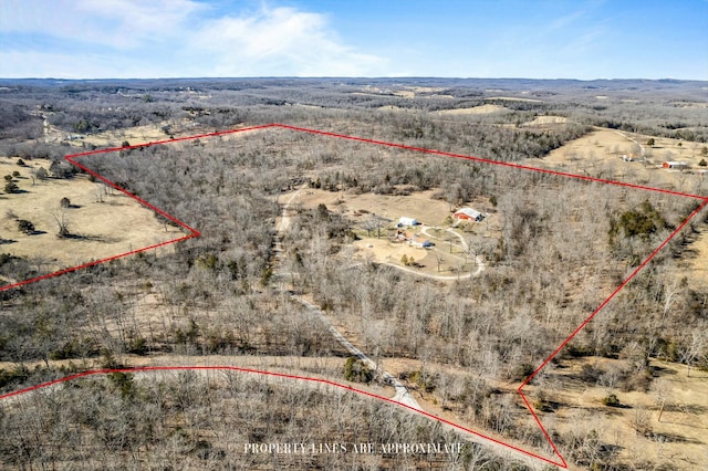 birds eye view of property with view of desert and a rural view