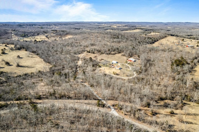 birds eye view of property with a rural view