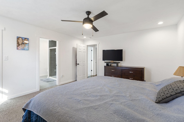 carpeted bedroom with a ceiling fan, recessed lighting, connected bathroom, and baseboards