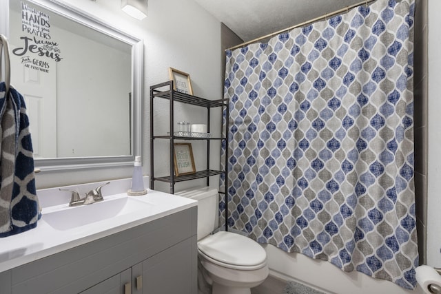 full bath with a textured ceiling, a textured wall, toilet, vanity, and shower / bathtub combination with curtain