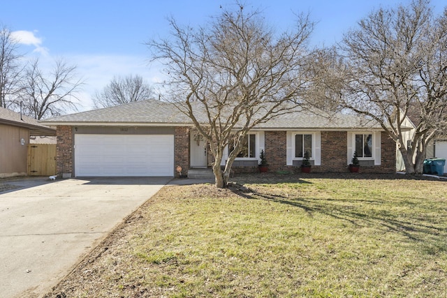 ranch-style home with concrete driveway, a front lawn, an attached garage, and brick siding