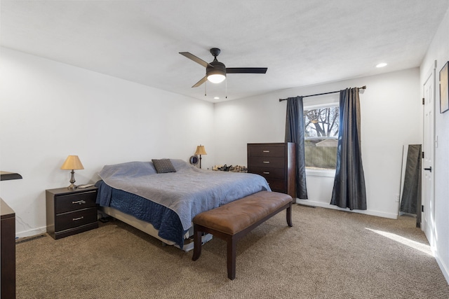 carpeted bedroom featuring a ceiling fan, recessed lighting, and baseboards