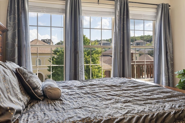 bedroom featuring access to outside